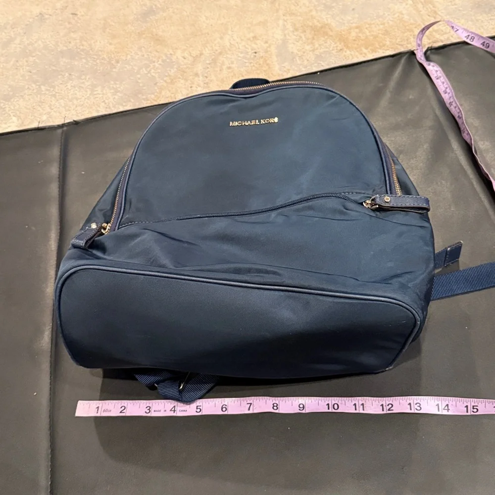 MICHAEL MICHAEL KORS navy Backpack with gold hardware GUC